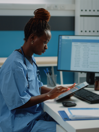 african american nurse using digital tablet treatment