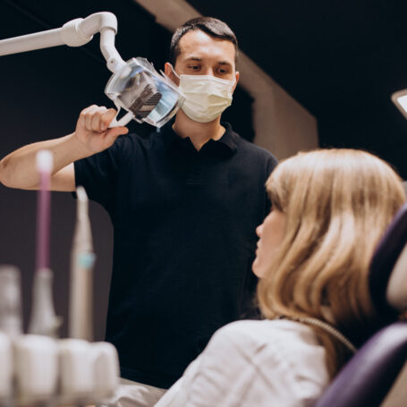 woman patient visiting dentist scaled